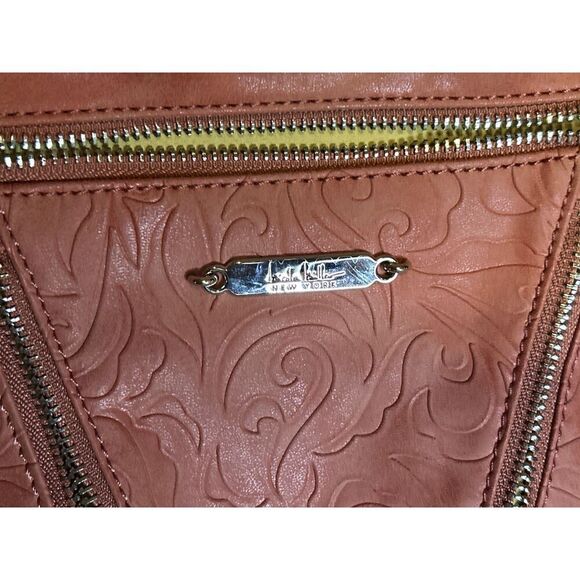 Nicole Miller Coral Crossbody Bag with Embossed Design - Picture 7 of 7